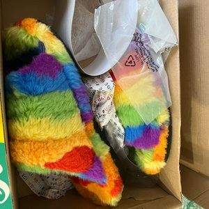 Brand new never worn slides. Fluff you cali collage